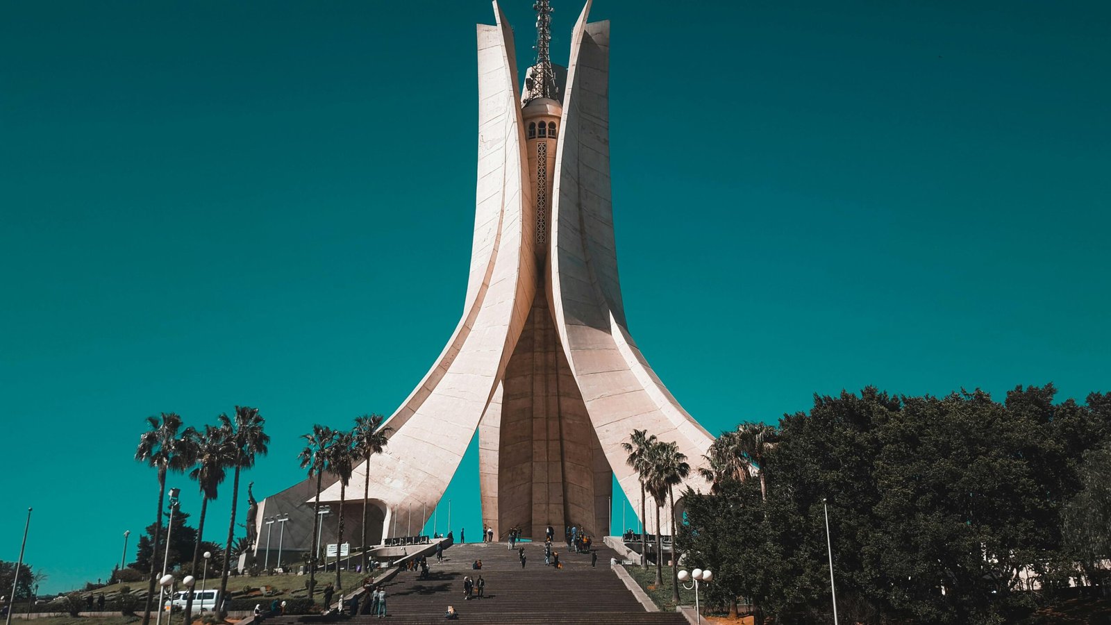 Stunning view of Martyrs Memorial, a landmark in Algiers, Algeria, with clear blue skies.